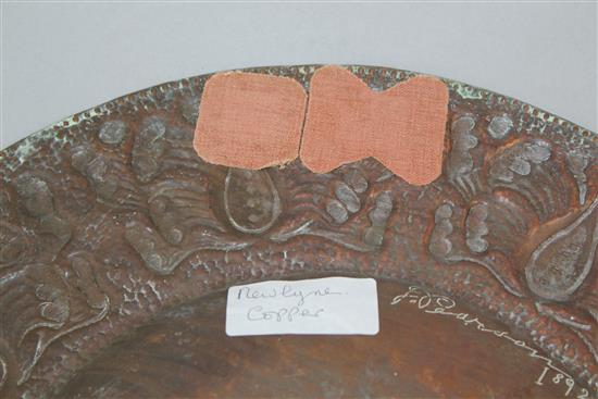 An Arts & Crafts Newlyn circular copper charger, by John Pearson, 15.25in.